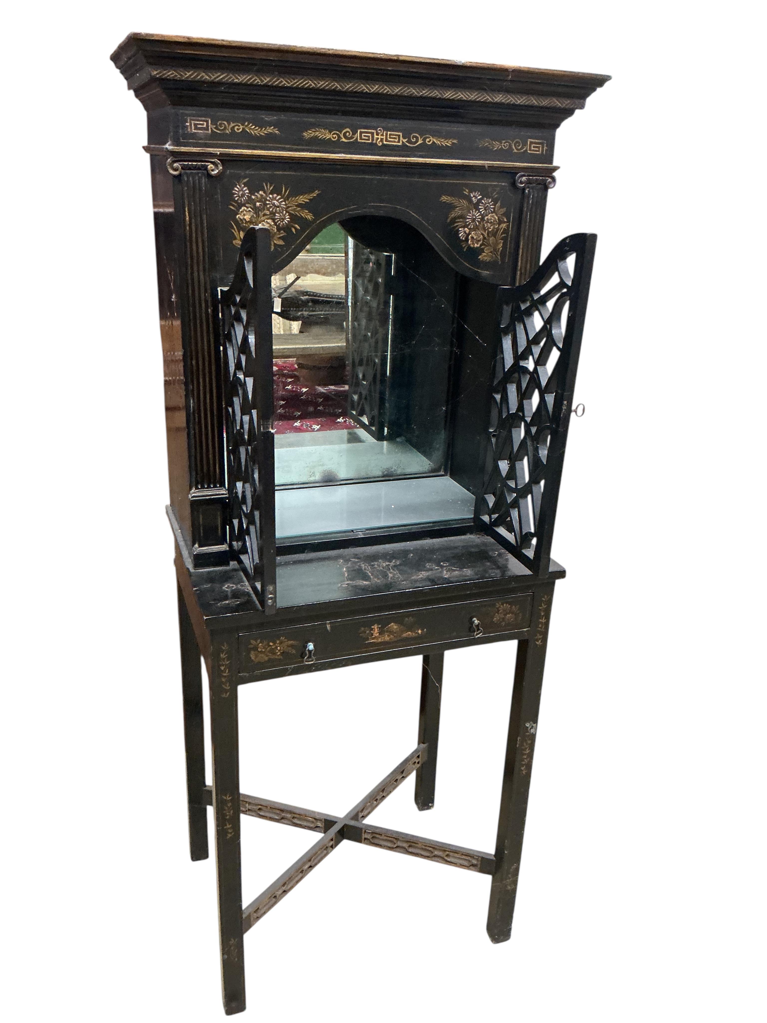 A chinoiserie lacquer cabinet on stand, width 63cm, depth 31cm, height 147cm